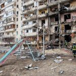 Building hit by Russian missile in Kyiv, Ukraine. Editorial credit: Drop of Light / Shutterstock.com