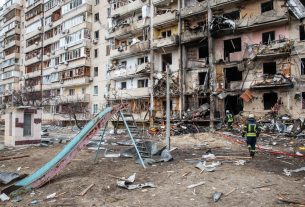 Building hit by Russian missile in Kyiv, Ukraine. Editorial credit: Drop of Light / Shutterstock.com