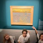 activists from Ultima Gnerazione glued under Van Gogh's The Sower in Rome