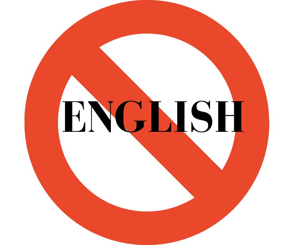 Ban English bill proposed by FdI. Image shows red stop sign with English