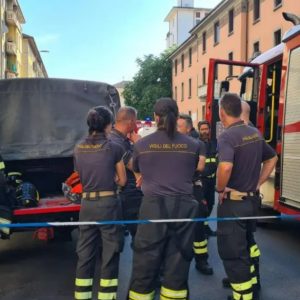 Milan retirement home fire - firefighters outside building