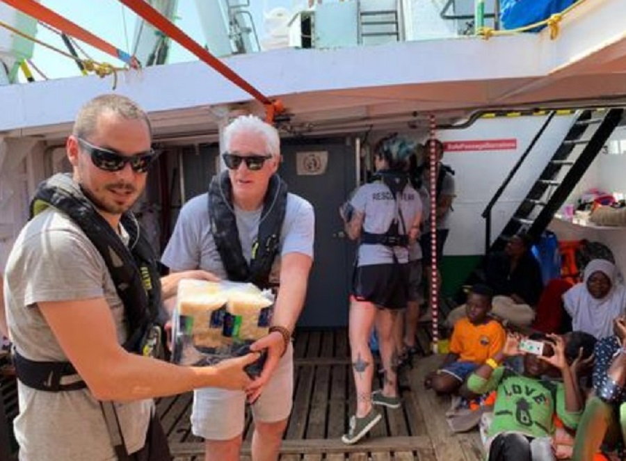 Richard Gere, pictured on board the rescue ship, will appear as a witness at the Open Arms trial against Matteo Salvini.