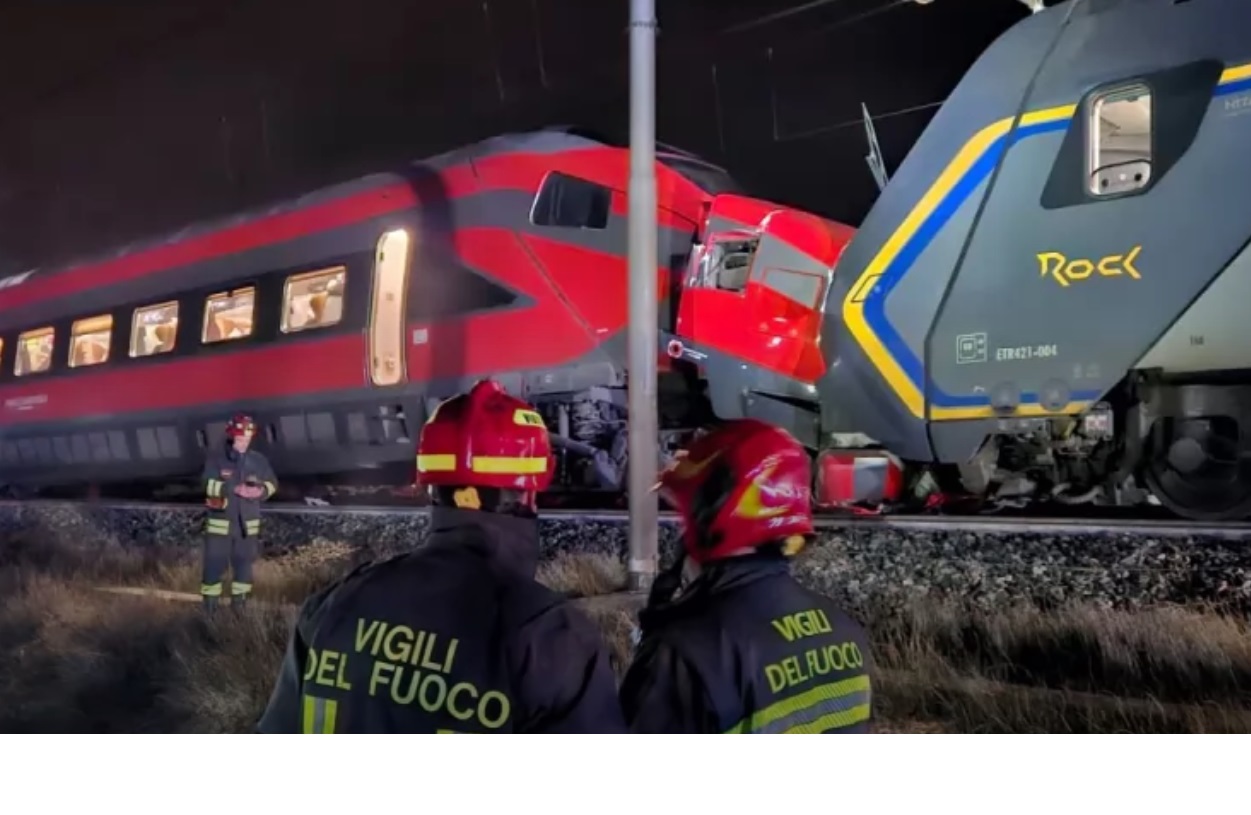 Photo by Vigili del FFuoco of low-speed train crash. Image shows the trains hit head on.
