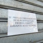 message on pizzeria shutter. Prosecutors are starting an inquiry into instigation of suicide over the owner's death.