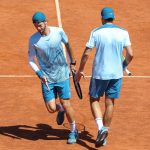 Bolelli and Vavassori pictured on court walking in opposite directions, are into the quarterfinals of the Italian Open men's doubles tournament