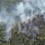 drone footage still of Puglia wildfires