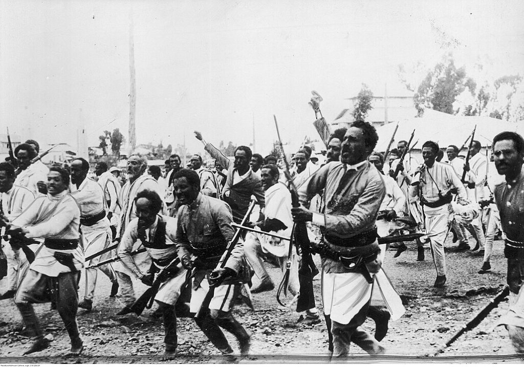 Abyssinian warriors going to the northern front during the Second Italo-Ethiopian War By Unknown author - Photographs available at www.audiovis.nac.gov.pl are public domain or the owner of the copyrights is the State Treasury of Poland, represented by the National Digital Archive and which grant free of charge licence for free use of the materials on all known exploitation fields., Public Domain, https://commons.wikimedia.org/w/index.php?curid=94481790