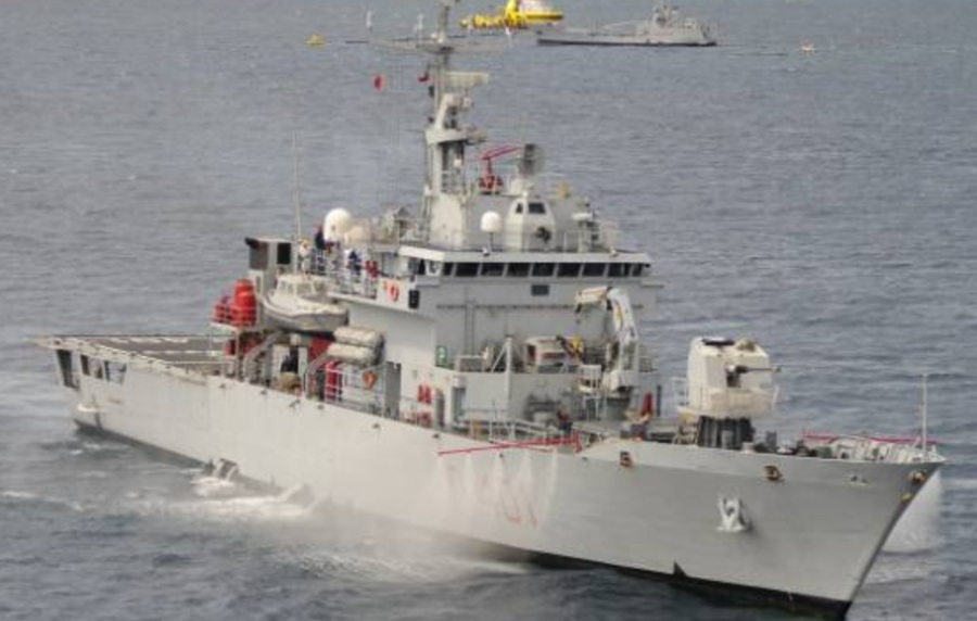 Italian naval ship Cassiopea is waiting to transfer migrants to Albania