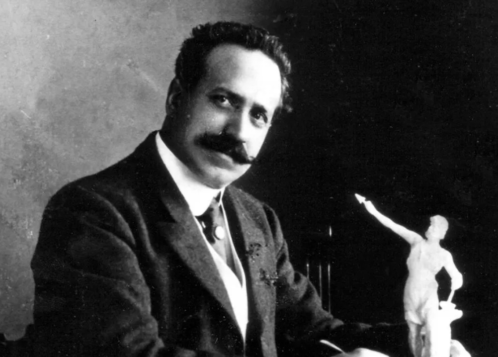 Giuseppe Moretti with a scale model of his Statue of Vulcan