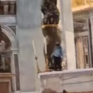 Still from video showing desecration of St Peter's altar