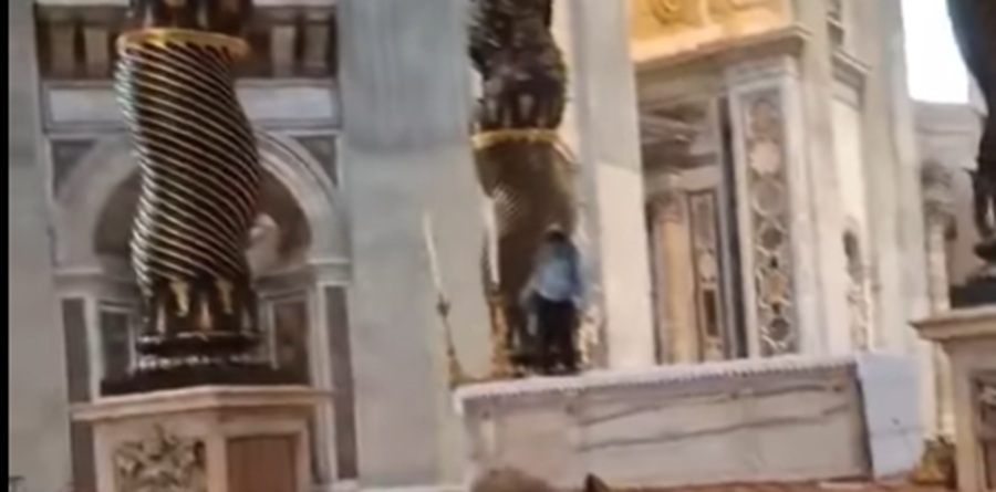 Still from video showing desecration of St Peter's altar