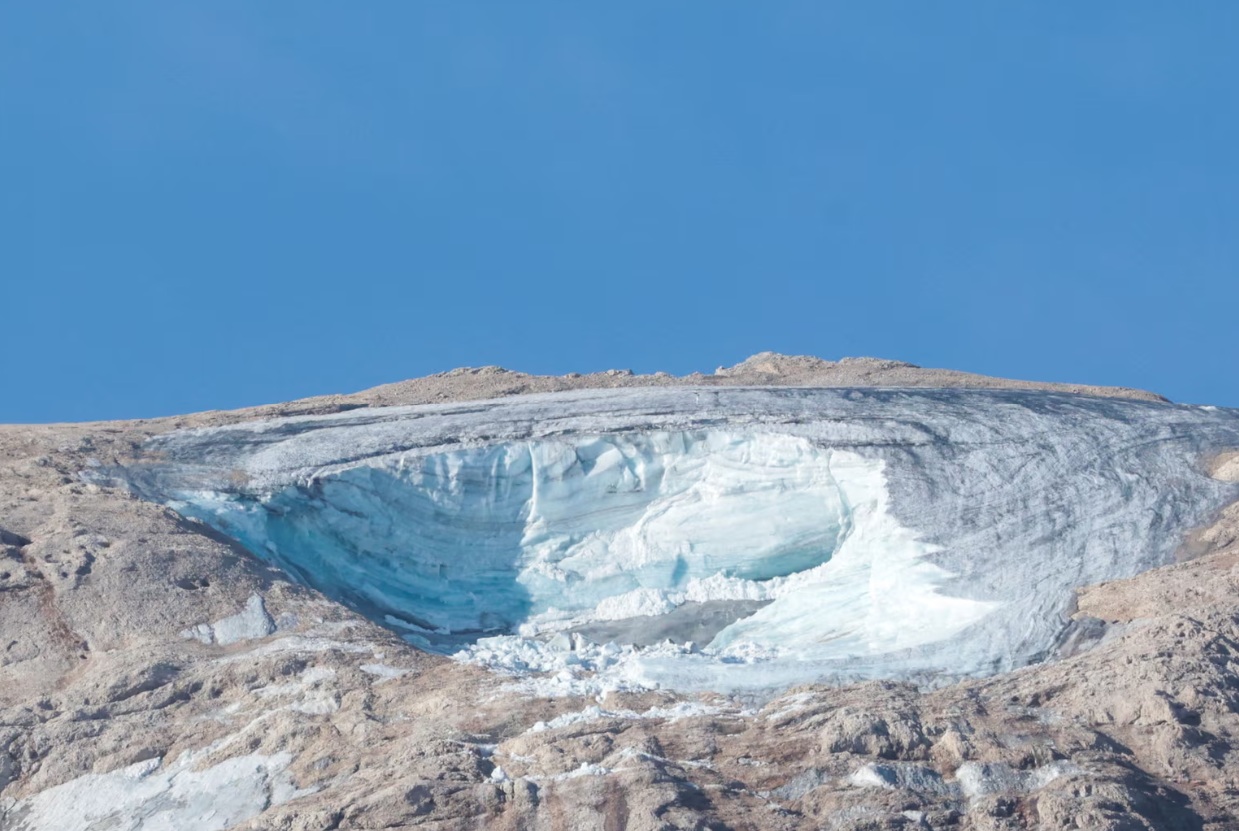Galcier governance called for to help slow down glacier collapses such as at Marmolada peak Dolomites - 2022. Image credit: Borut Živulovič/Reuters