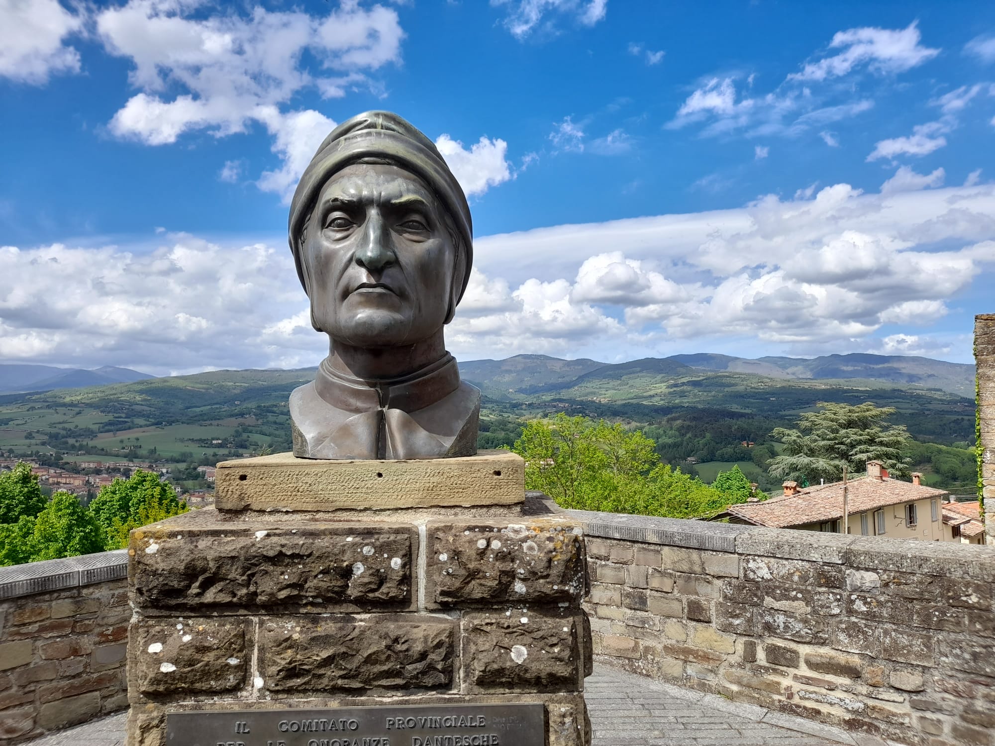 Sculpture of Dante's head.. Britain's monarchs will visit Dante's tomb as part of their state visit.
