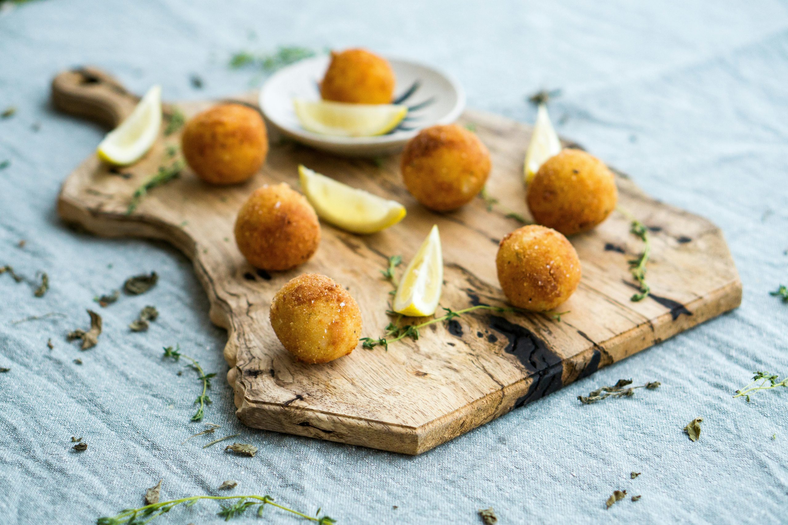 Arancini Photo by Anna Guerrero: https://www.pexels.com/photo/white-ceramic-saucer-1765012/