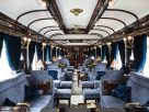 Luxury rail journeys - The Piano Bar of the Venice Simplon Orient Express. Image credit: https://mediahub.belmond.com/
