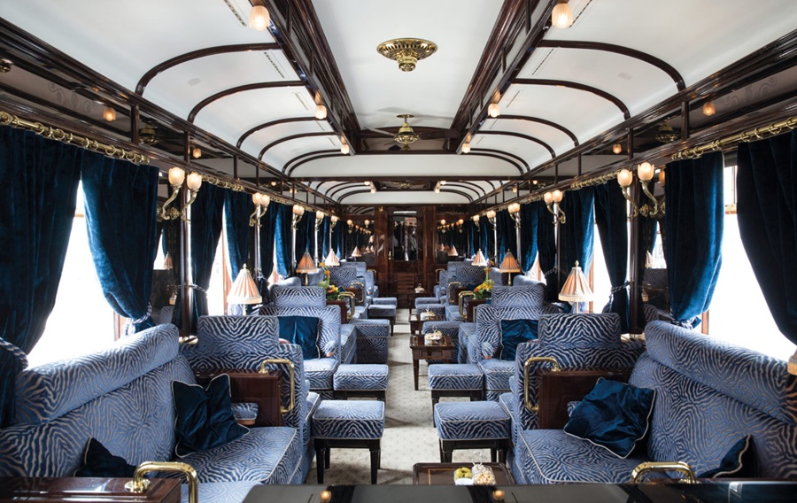 Luxury rail journeys - The Piano Bar of the Venice Simplon Orient Express. Image credit: https://mediahub.belmond.com/
