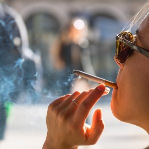 Campaign to raise cigarette prices by €5 Woman smoking a cigarette. Image credit: Susanne Nilsson, CC BY-SA 2.0 , via Wikimedia Commons