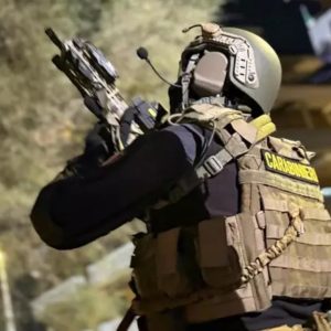 14 arrested in targeted Camorra operation in Rome Camorra group targeted in Rome police operation. Image shows armed carabinieri officer from the rear