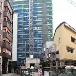 milan urban planning investigation - apartment block seized. Image shows apartment block under construction in Milan