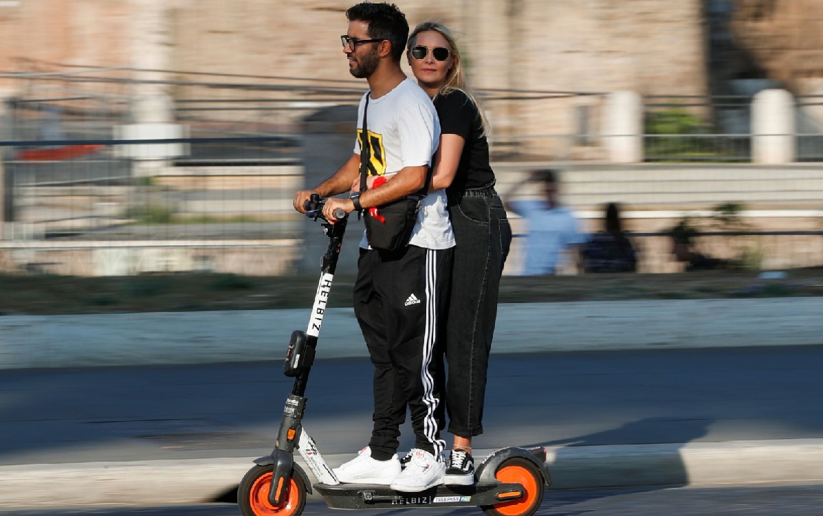 electric scooters require insurance and a targhino Photograph: Guglielmo Mangiapane/Reuters