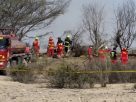 Peru Plane crash - firefighters attend the scene. Image credit: EPA