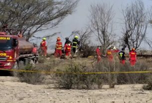 Peru Plane crash - firefighters attend the scene. Image credit: EPA