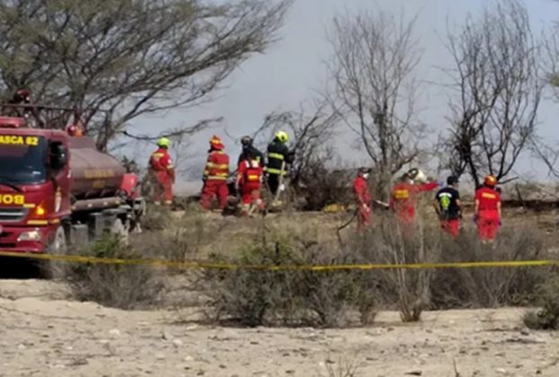 Peru Plane crash - firefighters attend the scene. Image credit: EPA