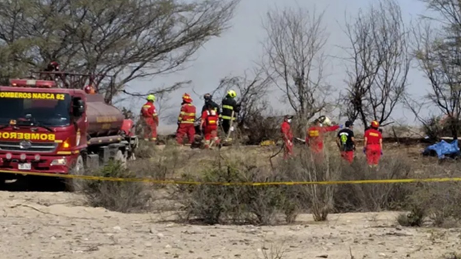 Peru Plane crash - firefighters attend the scene. Image credit: EPA