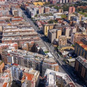 Parents, severely disabled daughter and family dog all found shot in home in Pietralata district of Rome. Image shows aerial view of the district.
