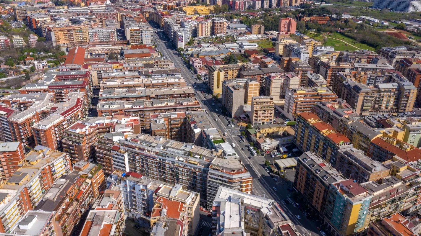 Parents, severely disabled daughter and family dog all found shot in home in Pietralata district of Rome. Image shows aerial view of the district.