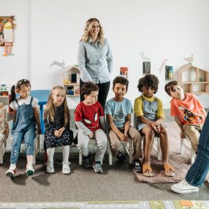 Group of children in a kindergarten classroom attending an interactive learning session with teachers. Image credit: Pavel Danilyuk https://www.pexels.com/license/
