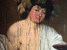 rainwater streaming down the protective casing over Caravaggio's Bacchus