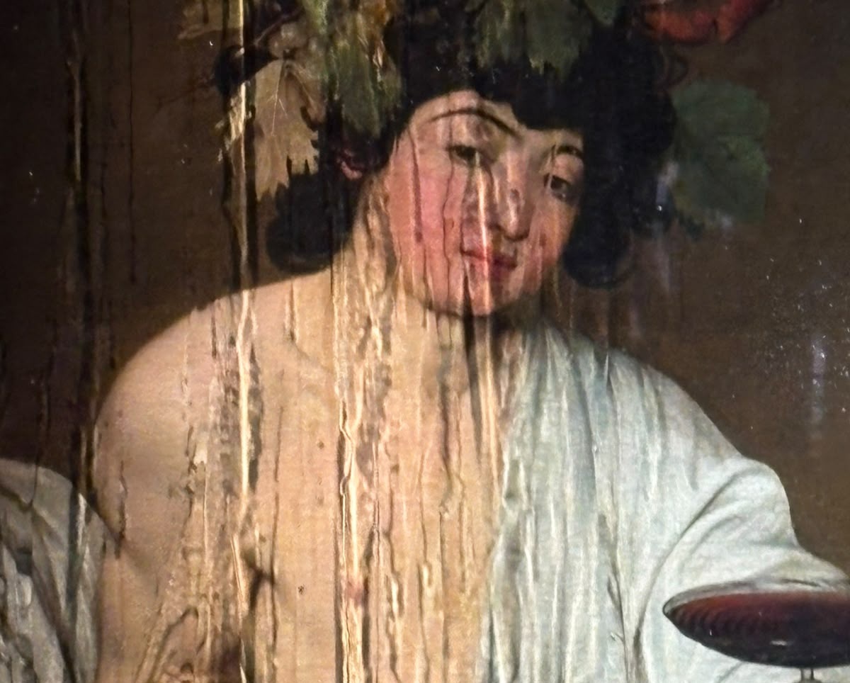 rainwater streaming down the protective casing over Caravaggio's Bacchus